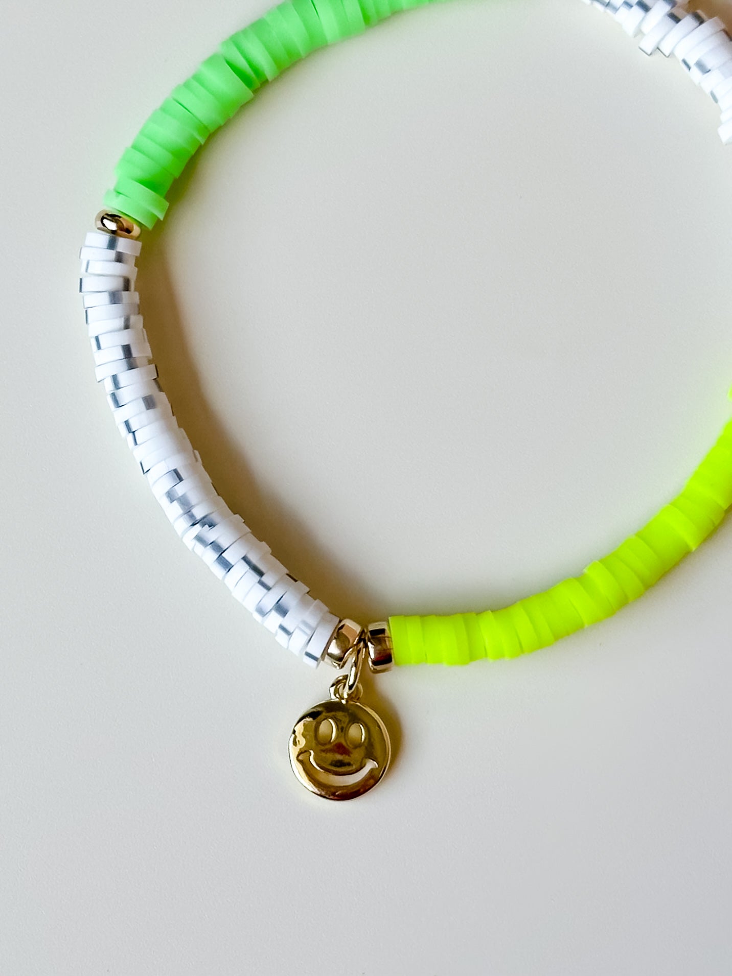 neon split color smiley charm bracelet