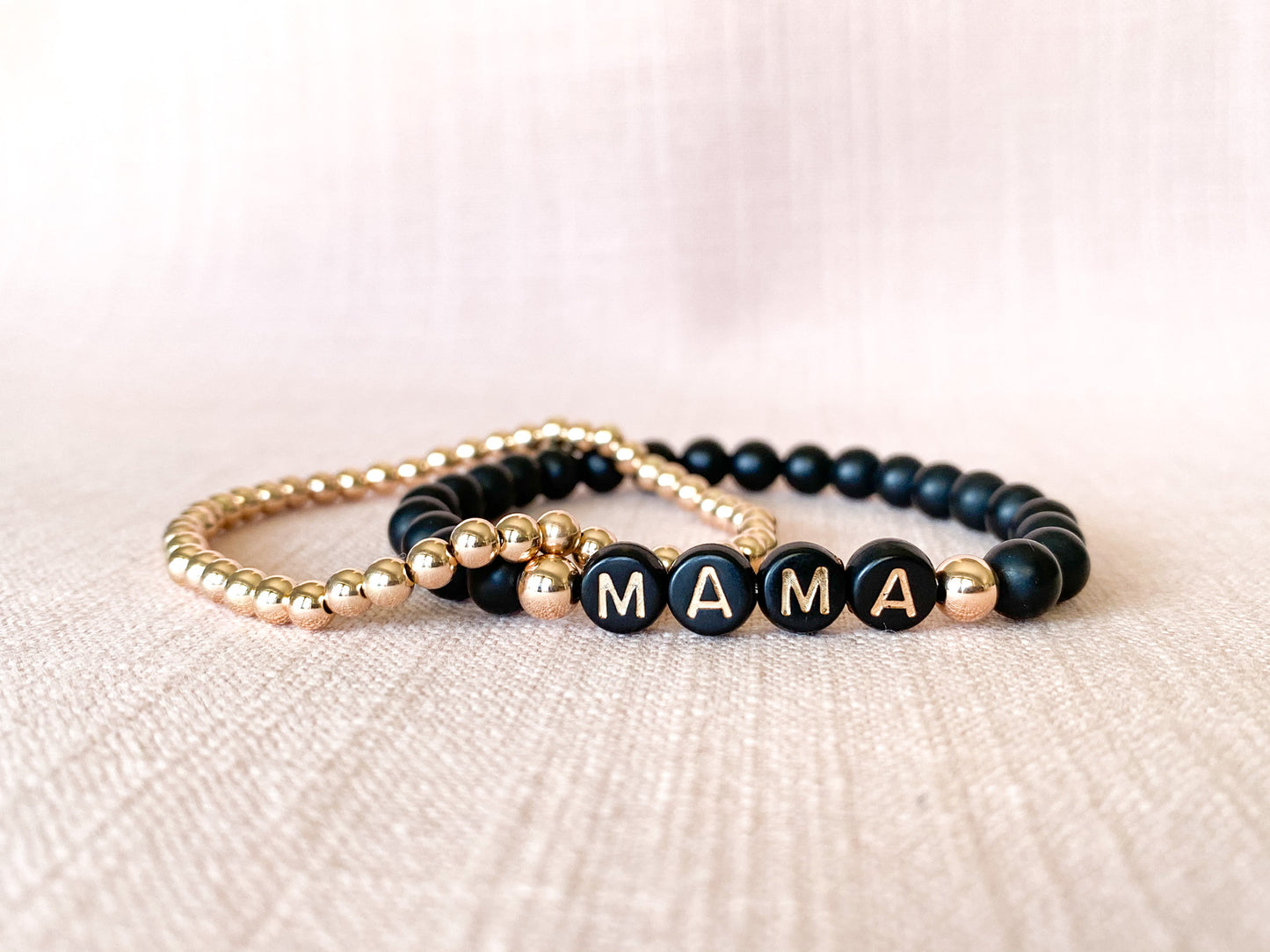 black & rose gold name bracelet stack