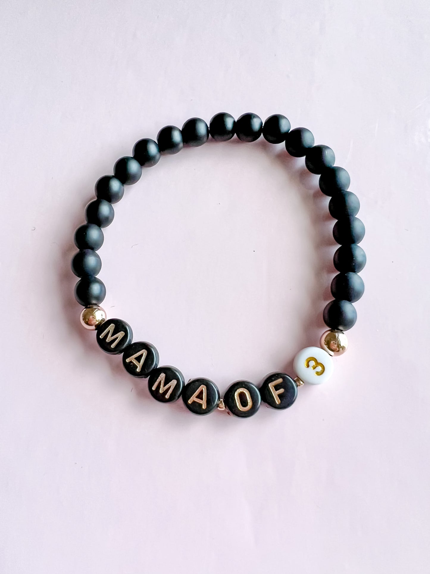 black & rose gold name bracelet stack