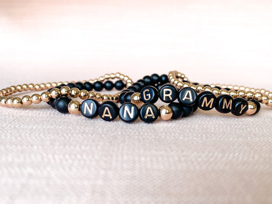 black & rose gold name bracelet stack
