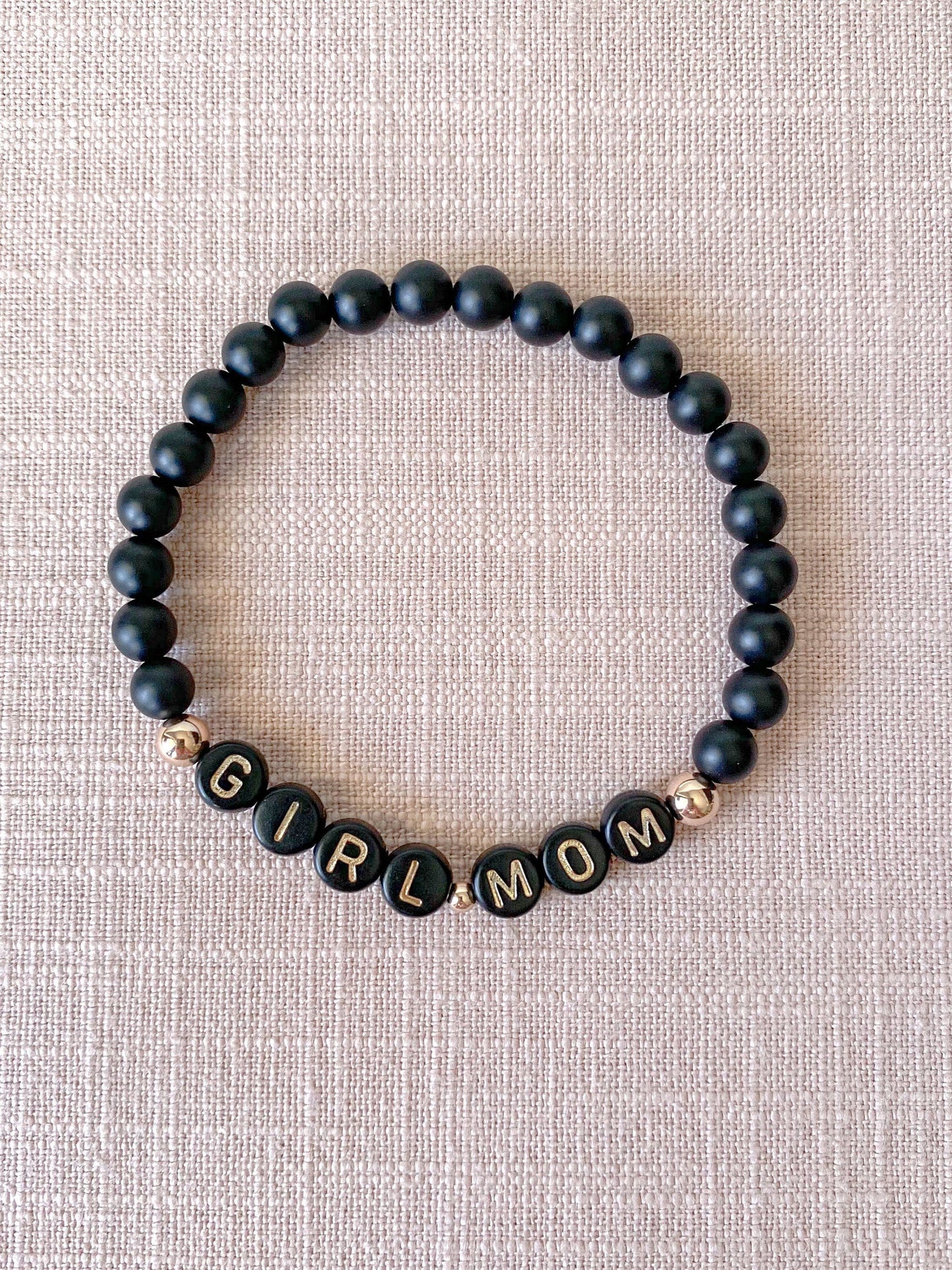 black & rose gold name bracelet stack